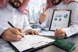 Consultants reviewing documentation with a client